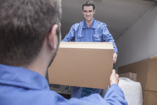 Removal team planning a Shoreditch move near urban flats